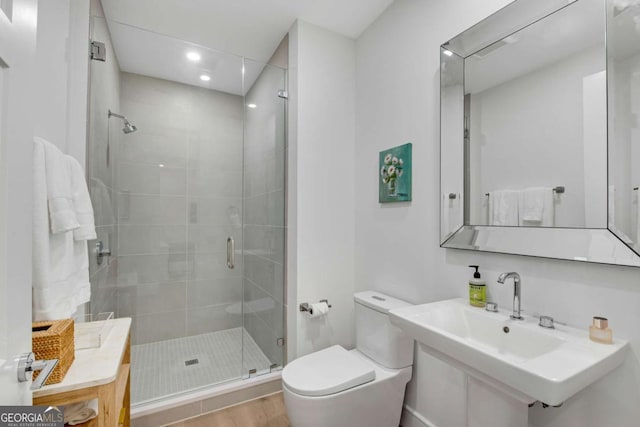 2425 Peachtree Rd NE Unit 902, Atlanta, GA 30305 - full bath with a stall shower, recessed lighting, and wood finished floors