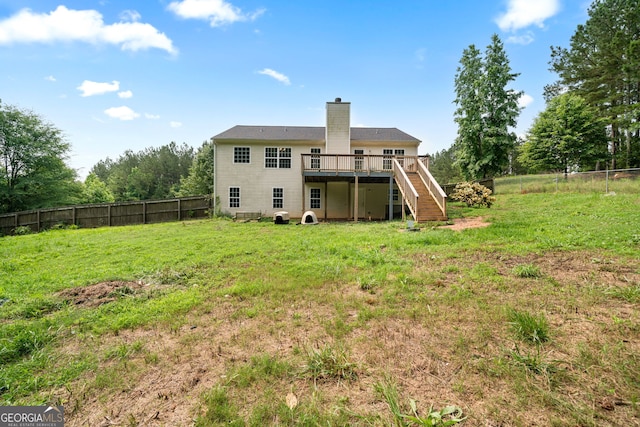 135 Pinewood Cir, Colbert, GA 30628 - rear view of property with stairs, a wooden deck, and a chimney