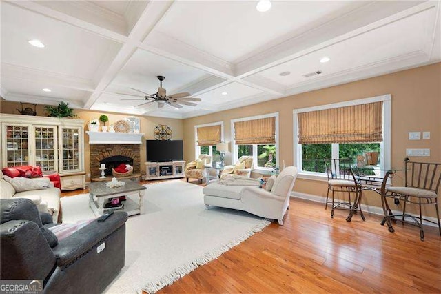 7131 Ridge Rd, Hiram, GA 30141 - living area featuring light wood finished floors, a ceiling fan, beam ceiling, recessed lighting, and coffered ceiling
