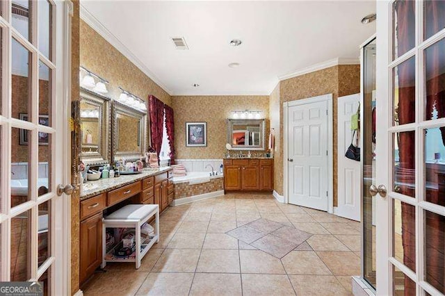 7131 Ridge Rd, Hiram, GA 30141 - bathroom featuring french doors, a garden tub, crown molding, vanity, and tile patterned floors