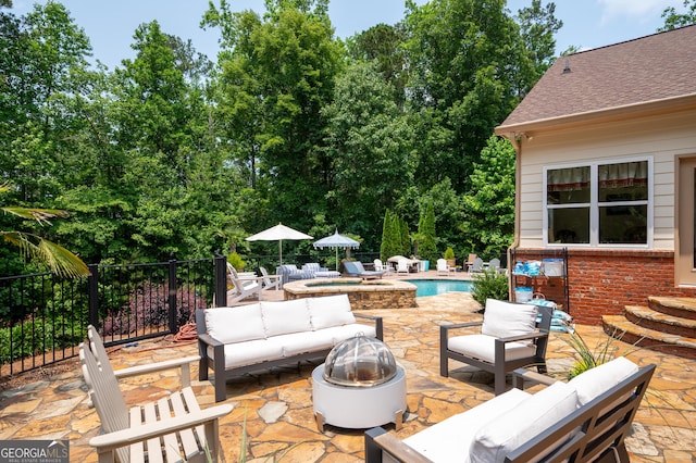 7131 Ridge Rd, Hiram, GA 30141 - view of patio / terrace with an outdoor living space with a fire pit and a pool with connected hot tub