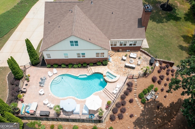 7131 Ridge Rd, Hiram, GA 30141 - view of swimming pool featuring a patio and a pool with connected hot tub