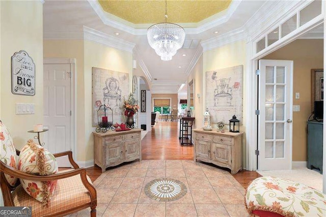 7131 Ridge Rd, Hiram, GA 30141 - corridor with light tile patterned flooring, ornamental molding, a chandelier, a tray ceiling, and recessed lighting