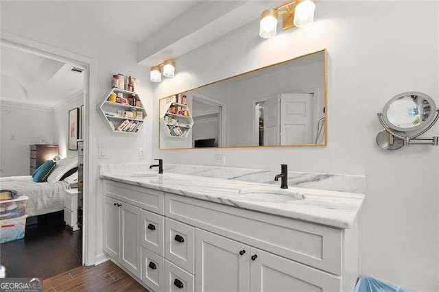 4213 Schooner Ct NE, Roswell, GA 30075 - full bath with connected bathroom, double vanity, wood finished floors, and crown molding