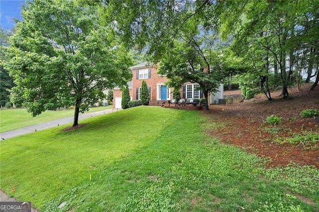 4213 Schooner Ct NE, Roswell, GA 30075 - colonial house featuring a front yard