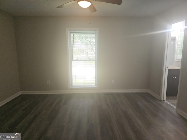 686 Favorwood Dr SW, Marietta, GA 30060 - unfurnished room with ceiling fan, dark wood-style flooring, and baseboards