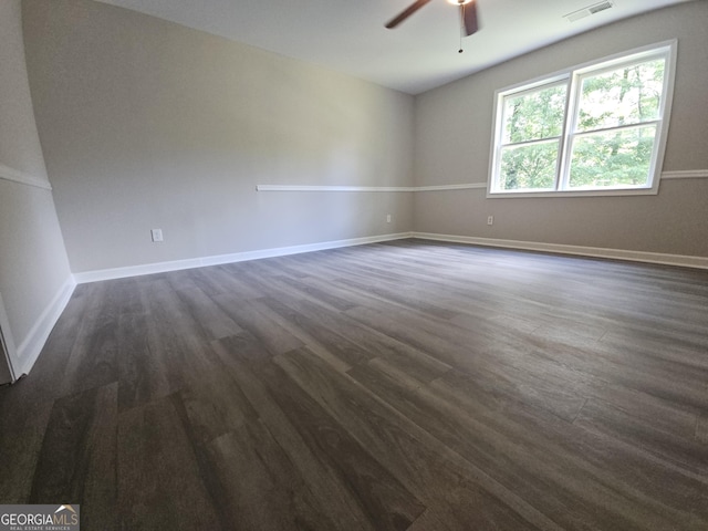 686 Favorwood Dr SW, Marietta, GA 30060 - empty room with a ceiling fan, dark wood-type flooring, and baseboards