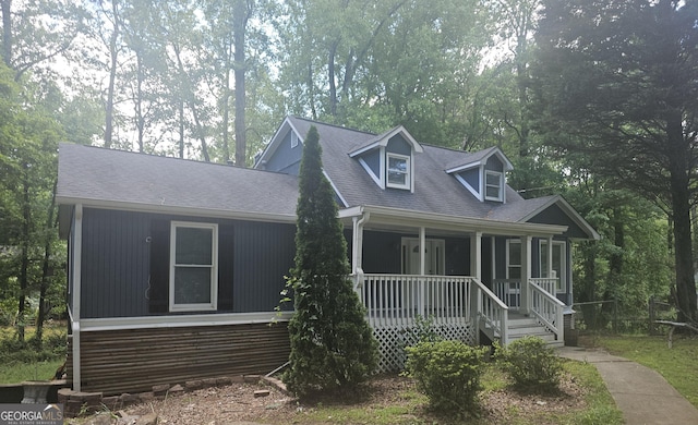 686 Favorwood Dr SW, Marietta, GA 30060 - cape cod house with covered porch and roof with shingles