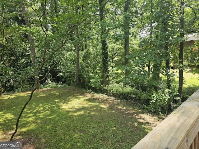 686 Favorwood Dr SW, Marietta, GA 30060 - view of green lawn featuring a wooded view