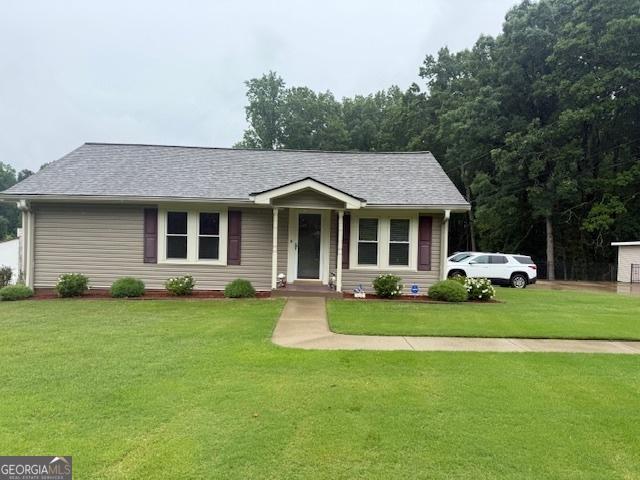 3964 Hamilton Mill Rd, Buford, GA 30519 - view of front of home featuring a front lawn and roof with shingles