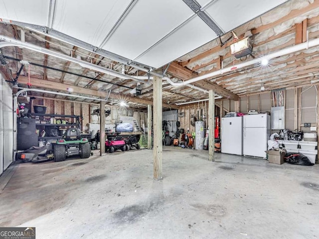 351 Danburg Ct, Jasper, GA 30143 - garage with freestanding refrigerator, fridge, water heater, a garage door opener, and electric panel