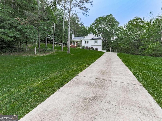 351 Danburg Ct, Jasper, GA 30143 - view of front of property featuring a front lawn, driveway, and a chimney