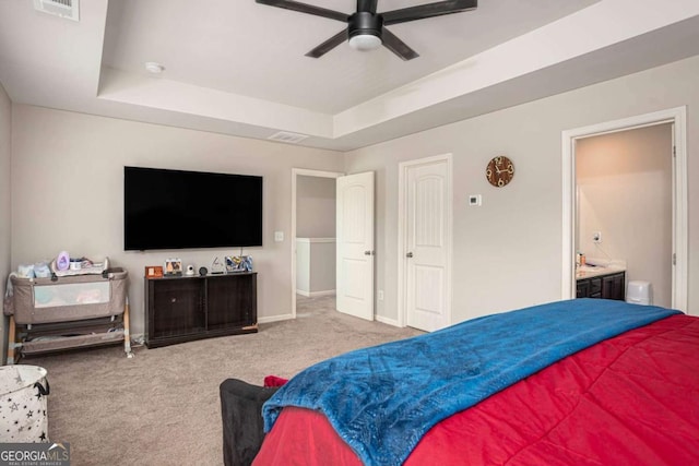 4732 Ridge Valley Dr, Gainesville, GA 30504 - bedroom featuring a raised ceiling, carpet floors, connected bathroom, baseboards, and a ceiling fan