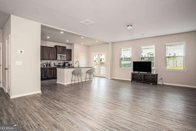4732 Ridge Valley Dr, Gainesville, GA 30504 - living room featuring dark wood finished floors, baseboards, and recessed lighting