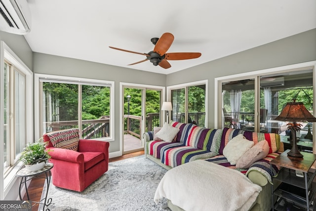 10875 Shagbark Trl, Roswell, GA 30075 - sunroom featuring a wall unit AC, healthy amount of natural light, and wood finished floors
