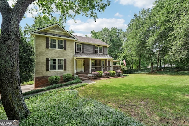 10875 Shagbark Trl, Roswell, GA 30075 - view of front of home featuring a porch, a front lawn, a standing seam roof, and a metal roof