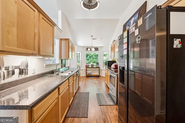 5102 Yellow Stone Dr, Flowery Branch, GA 30542 - kitchen with fridge with ice dispenser, a sink, light wood-style flooring, stainless steel electric stove, and decorative light fixtures
