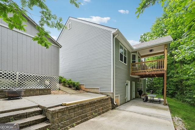 5102 Yellow Stone Dr, Flowery Branch, GA 30542 - view of side of property featuring a patio area