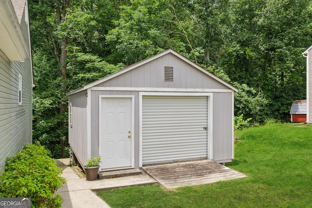 5102 Yellow Stone Dr, Flowery Branch, GA 30542 - garage featuring a storage shed