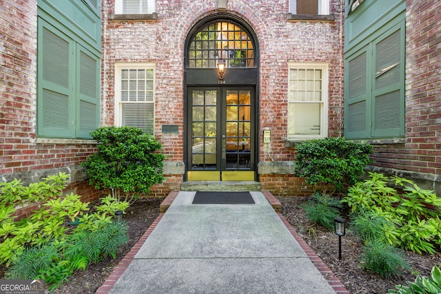 124 Lafayette Dr NE Unit 4, Atlanta, GA 30309 - doorway to property with french doors and brick siding
