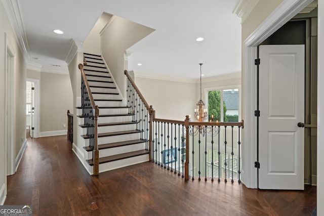 4530 Westgate Dr, Cumming, GA 30040 - staircase featuring a chandelier, wood finished floors, crown molding, and recessed lighting