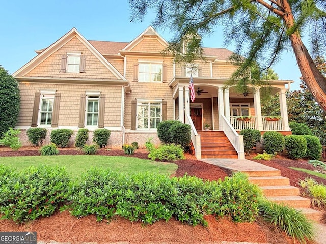 4530 Westgate Dr, Cumming, GA 30040 - view of front of property with a ceiling fan, covered porch, stairs, and a shingled roof