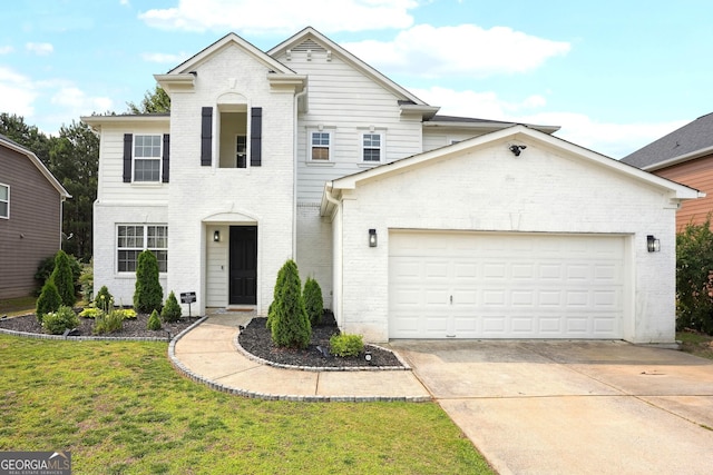 194 Branch Valley Way, Dallas, GA 30132 - view of front facade with brick siding, a garage, driveway, and a front yard