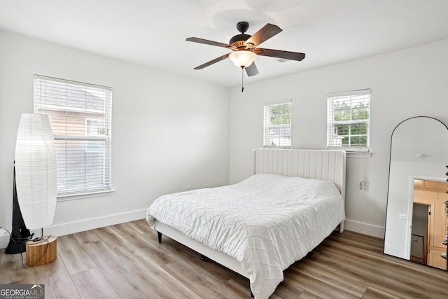 194 Branch Valley Way, Dallas, GA 30132 - bedroom featuring wood finished floors and a ceiling fan