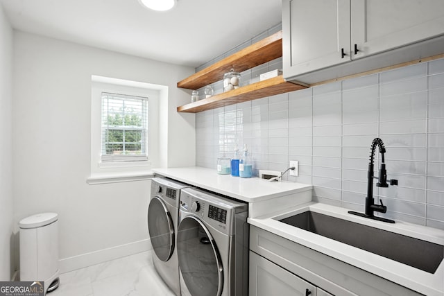 194 Branch Valley Way, Dallas, GA 30132 - washroom with cabinet space, washer and dryer, and marble finish floors