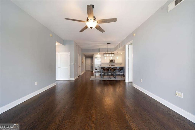 270 17th St NW Unit 2210, Atlanta, GA 30363 - living room with a ceiling fan and dark wood-type flooring