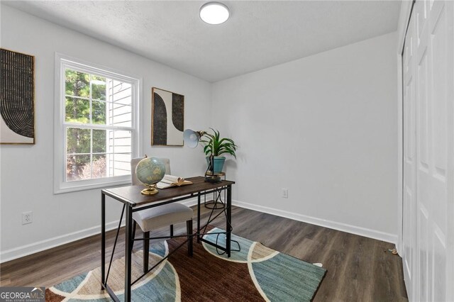 9404 Cypress Ln, Jonesboro, GA 30238 - office with baseboards and dark wood-type flooring