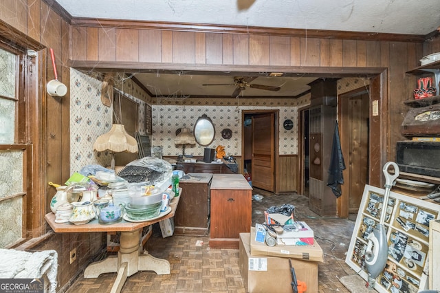 205 Elm St, Washington, GA 30673 - kitchen featuring wood walls, wallpapered walls, and ornamental molding