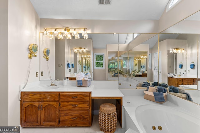 607 Lees Mill Rd, Fayetteville, GA 30214 - full bathroom featuring a whirlpool tub, vanity, a chandelier, and tile patterned flooring
