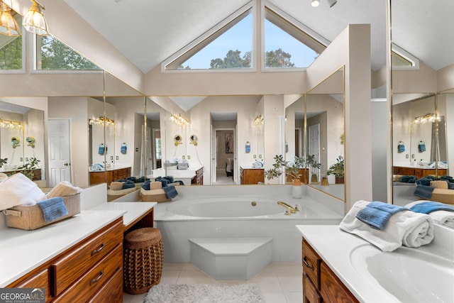 607 Lees Mill Rd, Fayetteville, GA 30214 - full bath featuring high vaulted ceiling, a chandelier, tile patterned flooring, a garden tub, and vanity