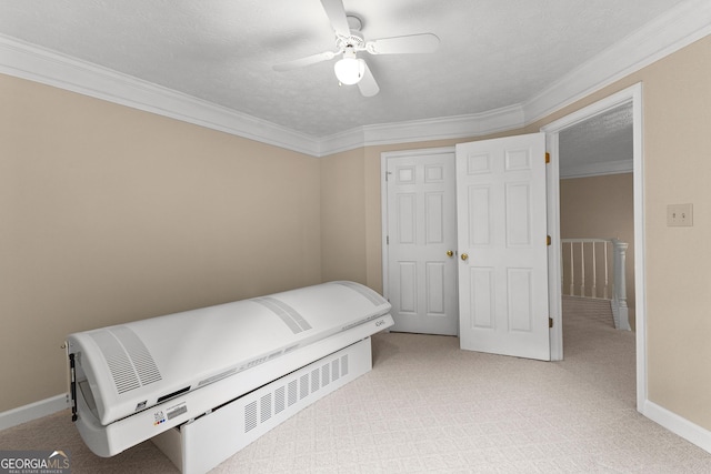 607 Lees Mill Rd, Fayetteville, GA 30214 - bedroom with crown molding, light colored carpet, baseboards, ceiling fan, and a textured ceiling