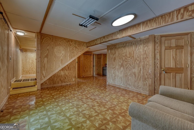 224 Shake Rag Rd, Hiawassee, GA 30546 - finished basement featuring wood walls, baseboards, and light floors