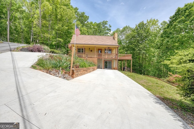 224 Shake Rag Rd, Hiawassee, GA 30546 - view of front facade with a chimney and concrete driveway
