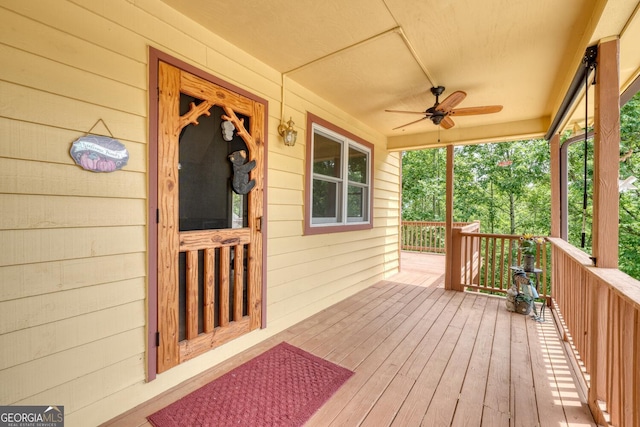 224 Shake Rag Rd, Hiawassee, GA 30546 - wooden porch with a ceiling fan