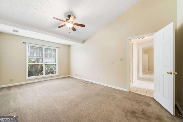467 Ravinia Way, Lawrenceville, GA 30044 - carpeted spare room with ceiling fan, baseboards, lofted ceiling, and a textured ceiling