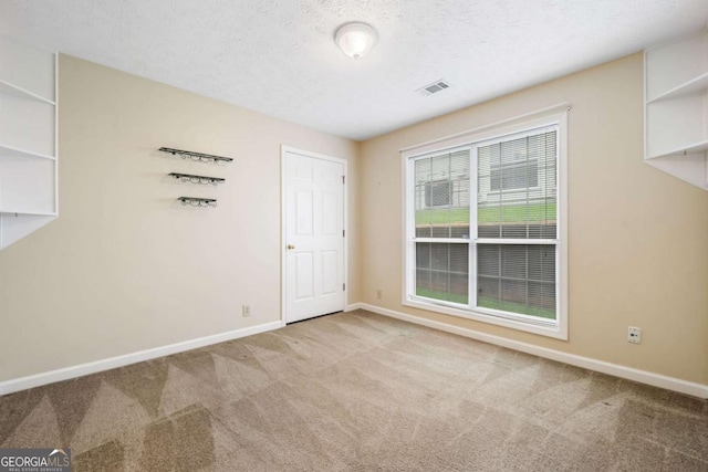 467 Ravinia Way, Lawrenceville, GA 30044 - carpeted spare room featuring baseboards and a textured ceiling