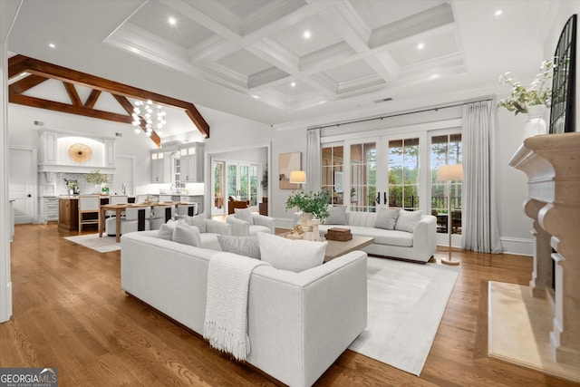 3057 Watsons Bnd, Milton, GA 30004 - living area featuring a high ceiling, beamed ceiling, recessed lighting, light wood-style floors, and french doors