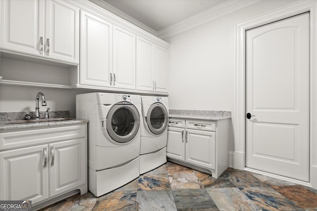 3057 Watsons Bnd, Milton, GA 30004 - washroom with cabinet space, crown molding, light stone finish floors, and washer and dryer