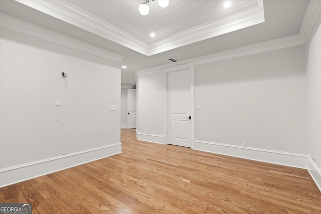 3057 Watsons Bnd, Milton, GA 30004 - unfurnished room featuring a tray ceiling, ornamental molding, light wood-style floors, and recessed lighting
