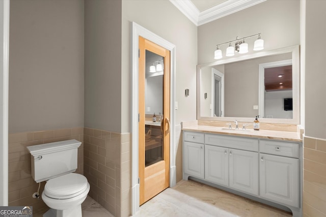 3057 Watsons Bnd, Milton, GA 30004 - bathroom featuring crown molding, tile walls, vanity, and wainscoting