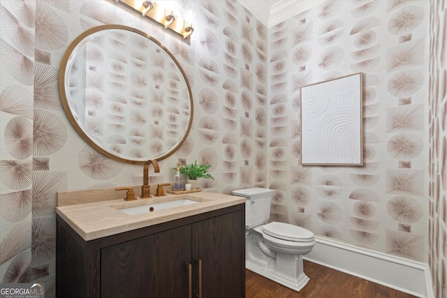 3057 Watsons Bnd, Milton, GA 30004 - half bathroom with wallpapered walls, vanity, wood finished floors, and crown molding