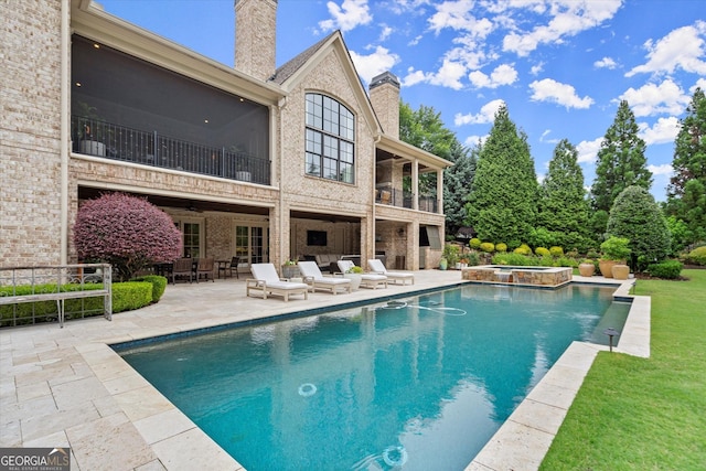 3057 Watsons Bnd, Milton, GA 30004 - view of pool featuring a ceiling fan, a patio, a pool with connected hot tub, and a yard