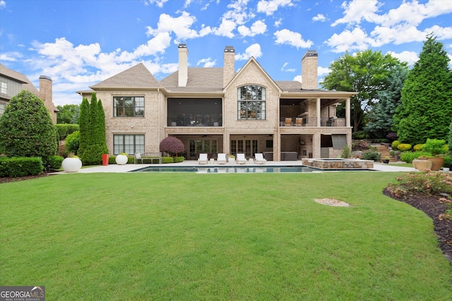 3057 Watsons Bnd, Milton, GA 30004 - back of property with a balcony, a yard, a patio, and an outdoor pool