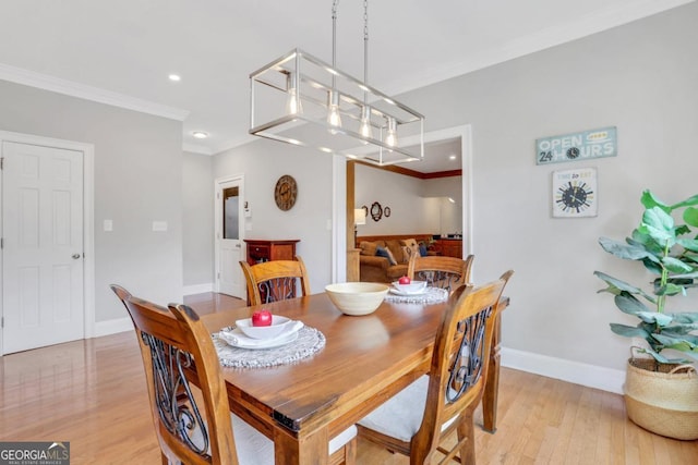 2535 Winthrope Way, Lawrenceville, GA 30044 - dining space featuring crown molding, light wood finished floors, baseboards, and recessed lighting