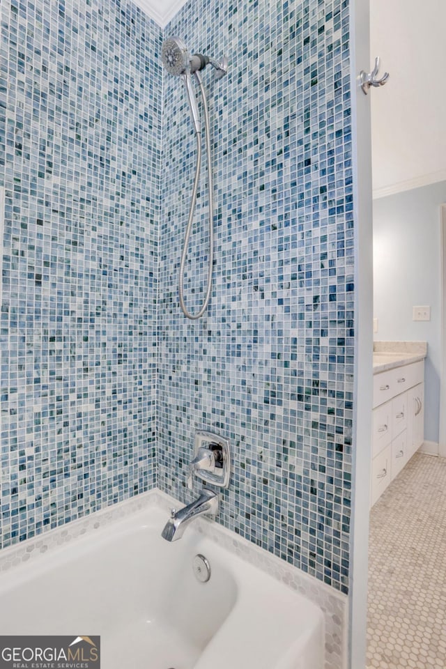 2535 Winthrope Way, Lawrenceville, GA 30044 - full bath featuring ornamental molding, washtub / shower combination, and vanity