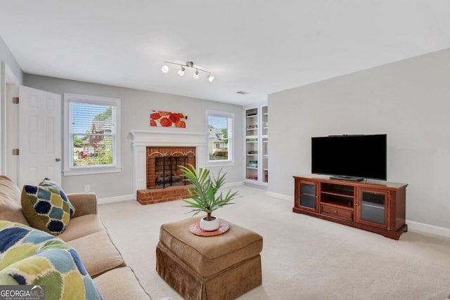 2535 Winthrope Way, Lawrenceville, GA 30044 - carpeted living area with built in features, baseboards, and a brick fireplace